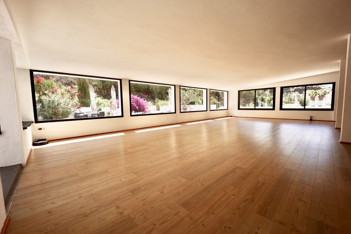 The spacious wooden-floored movement studio at Casa Agama